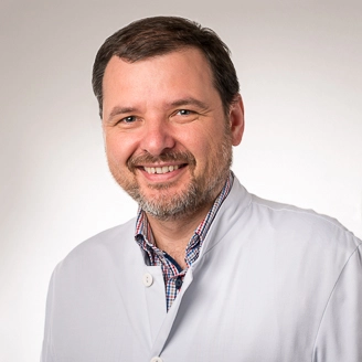 Dr. Lucian M. Macrea